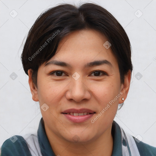 Joyful asian young-adult female with short  brown hair and brown eyes