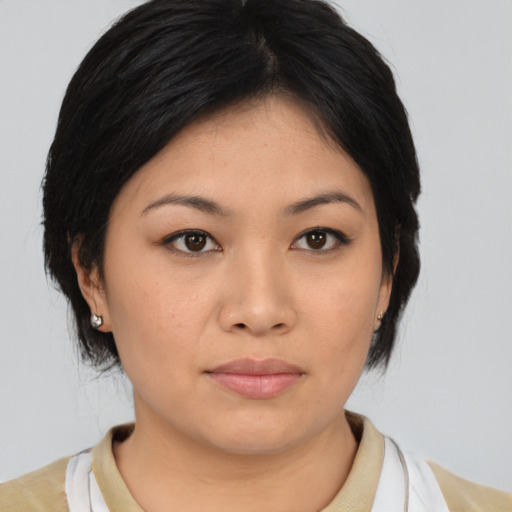 Neutral asian young-adult female with medium  black hair and brown eyes