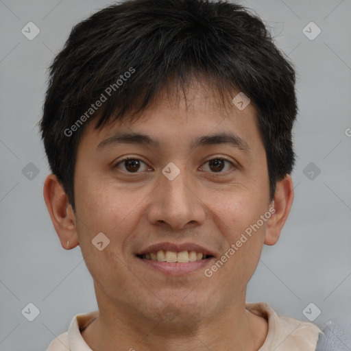 Joyful white adult male with short  brown hair and brown eyes