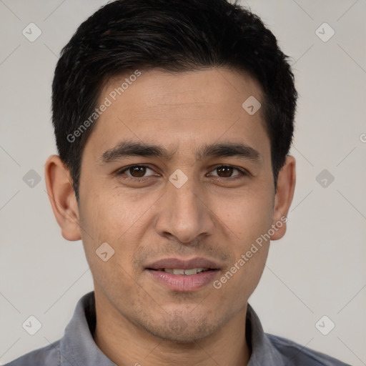 Joyful white young-adult male with short  black hair and brown eyes