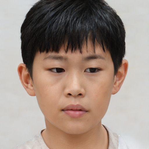 Neutral asian child male with short  black hair and brown eyes