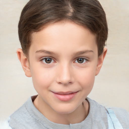 Joyful white child female with short  brown hair and brown eyes