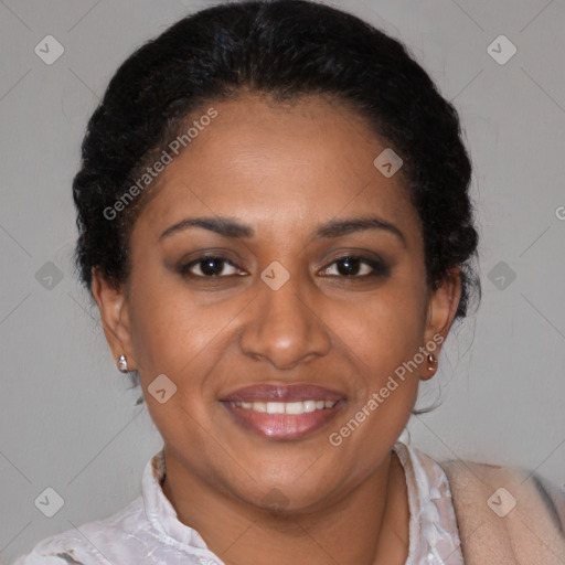 Joyful latino adult female with short  brown hair and brown eyes