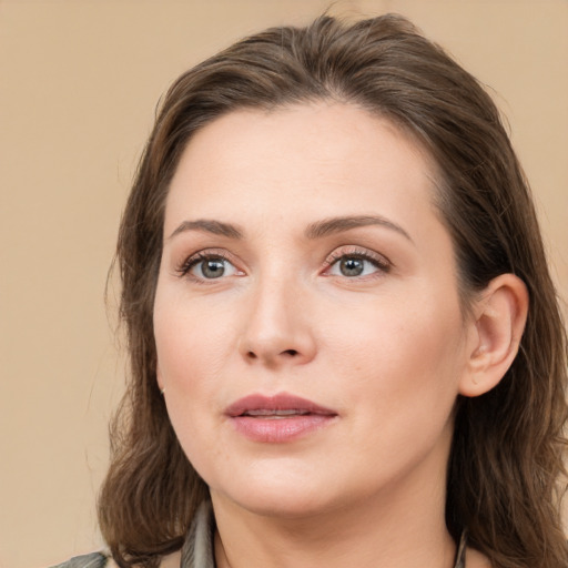 Neutral white young-adult female with medium  brown hair and brown eyes