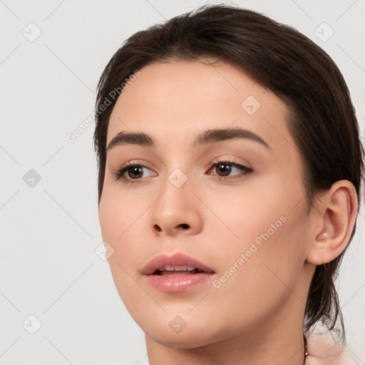 Neutral white young-adult female with medium  brown hair and brown eyes