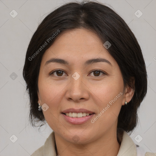 Joyful white adult female with medium  brown hair and brown eyes