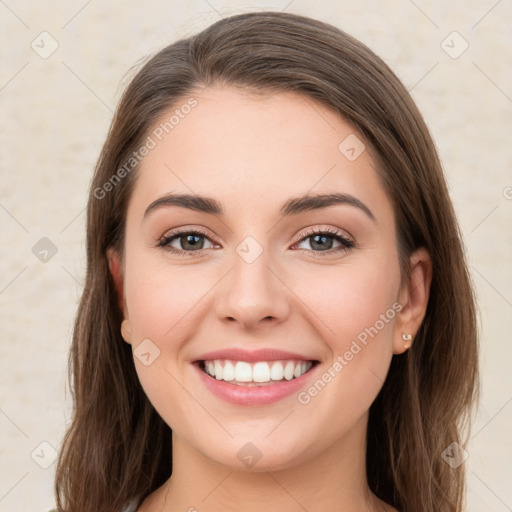 Joyful white young-adult female with long  brown hair and green eyes