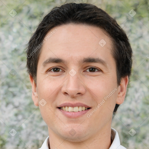 Joyful white adult male with short  brown hair and brown eyes