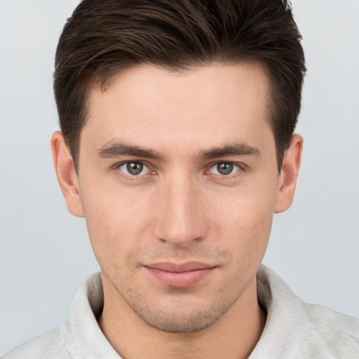 Neutral white young-adult male with short  brown hair and brown eyes