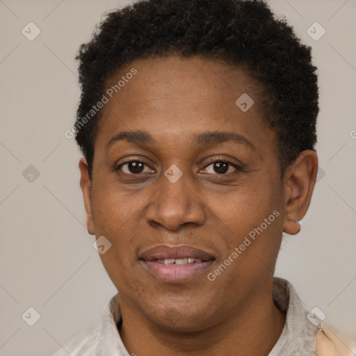 Joyful black adult female with short  brown hair and brown eyes