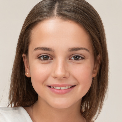 Joyful white child female with long  brown hair and brown eyes