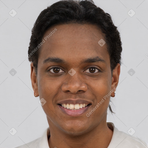 Joyful black young-adult male with short  black hair and brown eyes