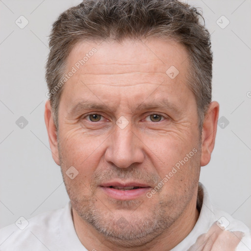 Joyful white middle-aged male with short  brown hair and brown eyes