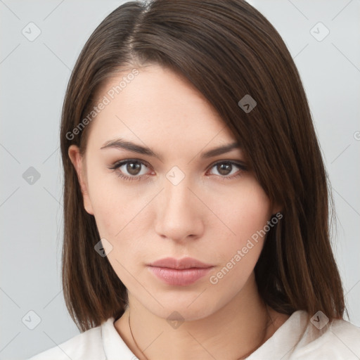 Neutral white young-adult female with medium  brown hair and brown eyes