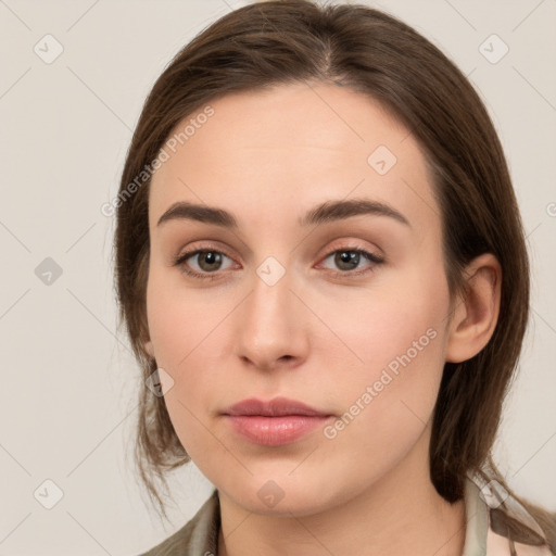 Neutral white young-adult female with medium  brown hair and brown eyes