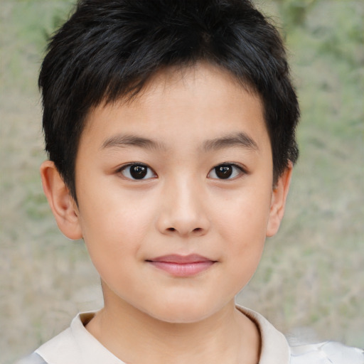 Joyful asian child female with short  brown hair and brown eyes