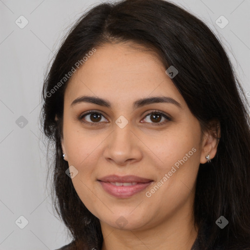 Joyful latino young-adult female with long  brown hair and brown eyes