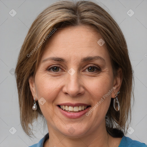 Joyful white adult female with medium  brown hair and grey eyes