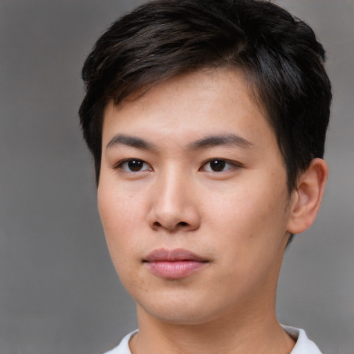 Neutral asian young-adult male with short  brown hair and brown eyes