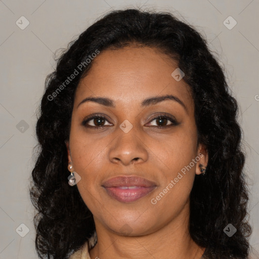 Joyful black young-adult female with long  brown hair and brown eyes