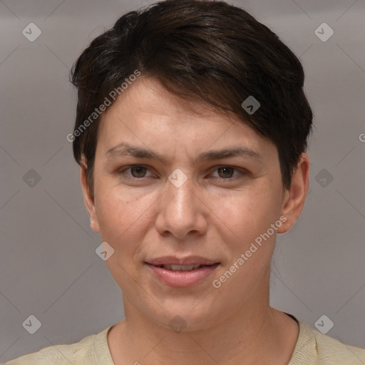 Joyful white adult female with short  brown hair and brown eyes