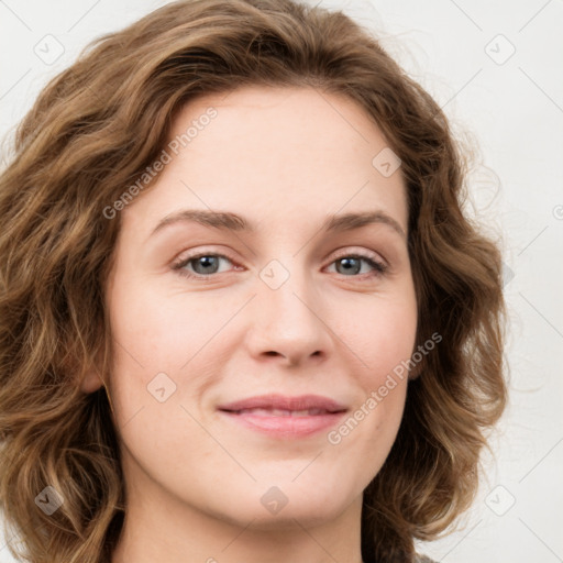 Joyful white young-adult female with medium  brown hair and green eyes