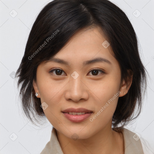 Joyful asian young-adult female with medium  brown hair and brown eyes