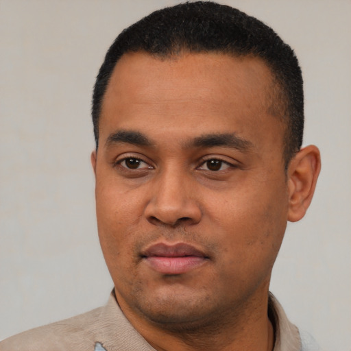 Neutral black young-adult male with short  black hair and brown eyes