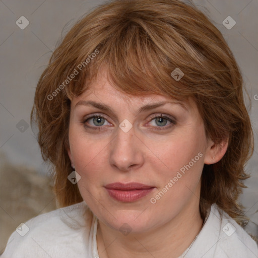 Joyful white adult female with medium  brown hair and blue eyes