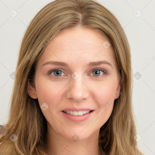 Joyful white young-adult female with long  brown hair and green eyes