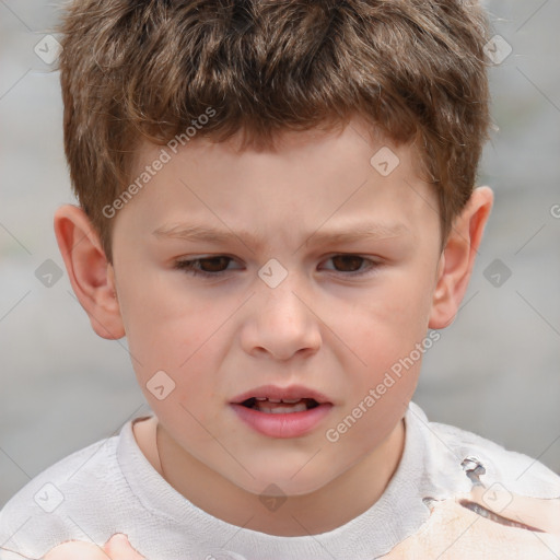 Joyful white child male with short  brown hair and brown eyes