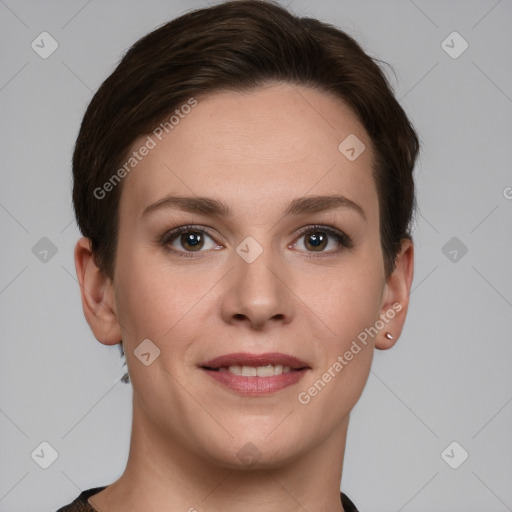 Joyful white young-adult female with short  brown hair and grey eyes