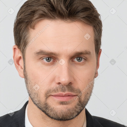 Neutral white young-adult male with short  brown hair and grey eyes