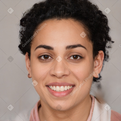 Joyful latino young-adult female with short  black hair and brown eyes