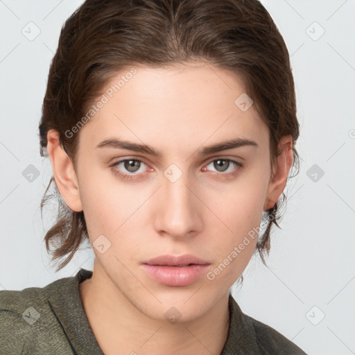 Neutral white young-adult female with medium  brown hair and brown eyes