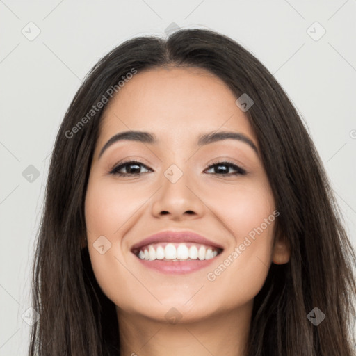 Joyful white young-adult female with long  black hair and brown eyes