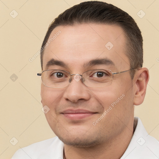 Joyful white young-adult male with short  brown hair and brown eyes