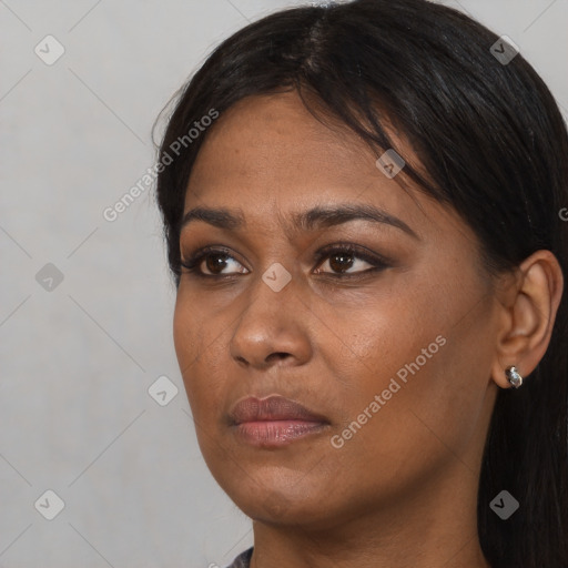 Neutral black young-adult female with long  black hair and brown eyes