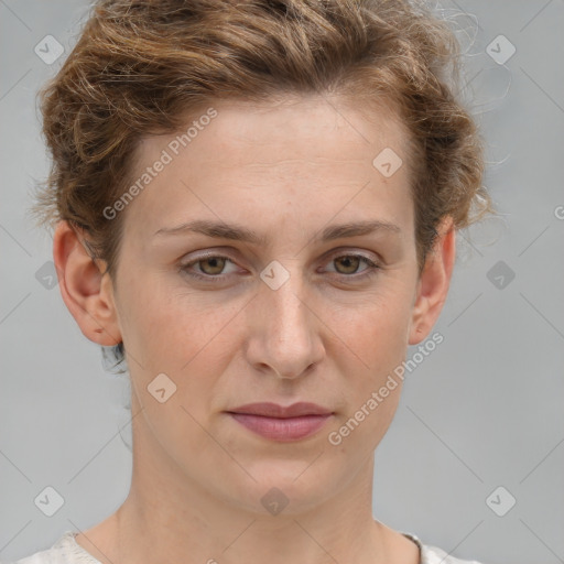 Joyful white adult female with short  brown hair and grey eyes