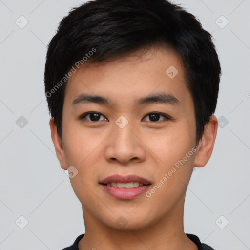 Joyful asian young-adult male with short  black hair and brown eyes