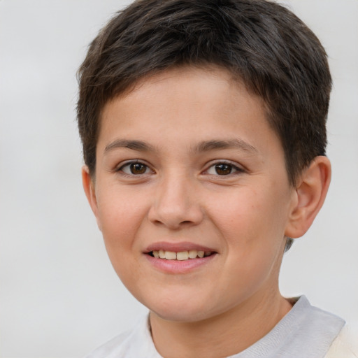Joyful white child female with short  brown hair and brown eyes