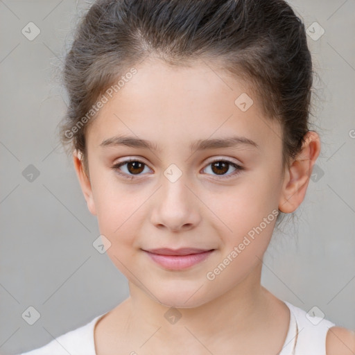 Joyful white child female with short  brown hair and brown eyes