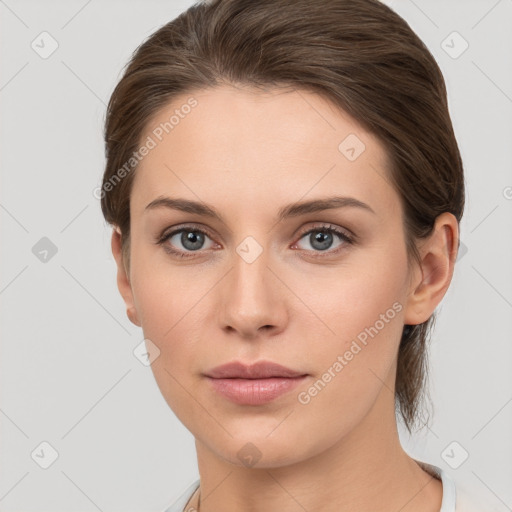 Neutral white young-adult female with medium  brown hair and grey eyes