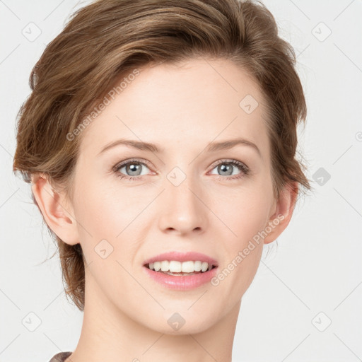 Joyful white young-adult female with short  brown hair and blue eyes