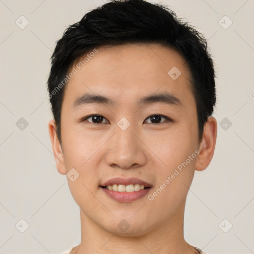 Joyful asian young-adult male with short  black hair and brown eyes