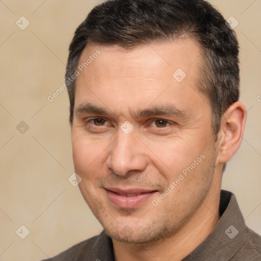 Joyful white adult male with short  brown hair and brown eyes