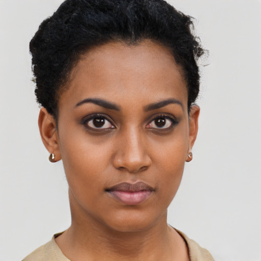 Neutral black young-adult female with short  brown hair and brown eyes