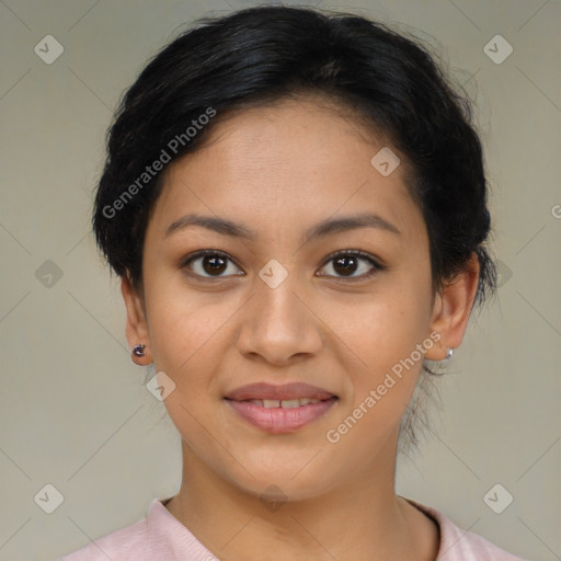 Joyful latino young-adult female with medium  brown hair and brown eyes