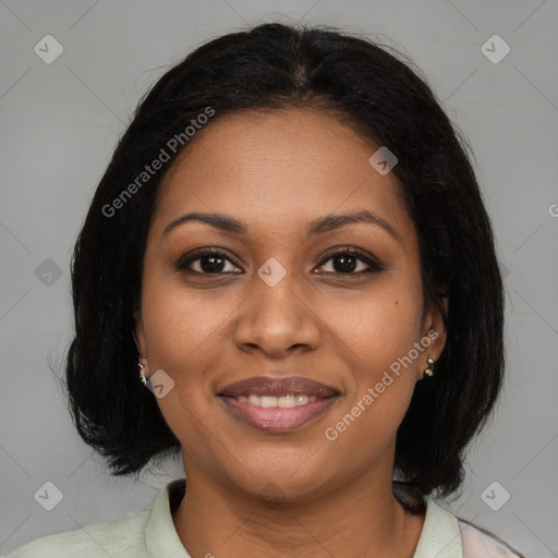 Joyful black young-adult female with medium  brown hair and brown eyes