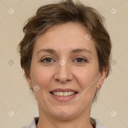 Joyful white adult female with short  brown hair and brown eyes